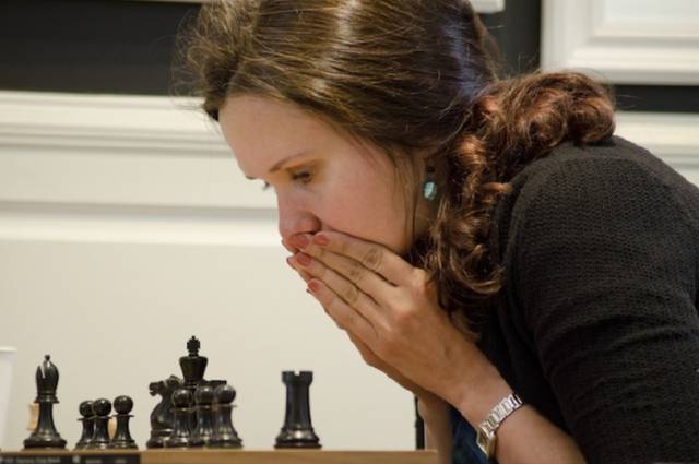 Anna Zatonskih plays multiple games of chess